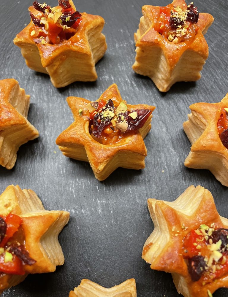 Star shaped savoury pastries served as canapés