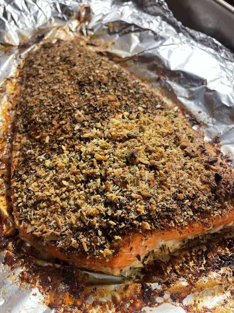 Gourmet dessert topped with a textured crumb layer
