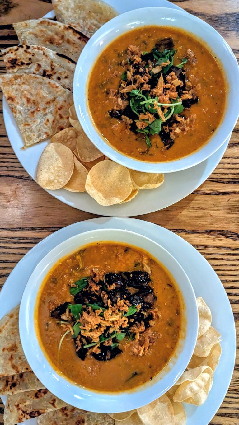 Savoury soup served with bread