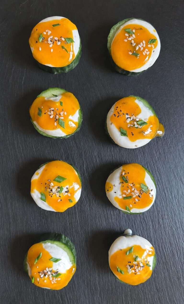 Gourmet canapé bites with orange topping