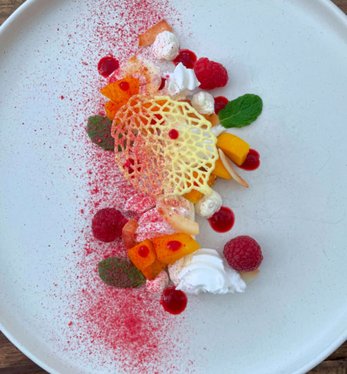 Gourmet dessert plate served at a supper club